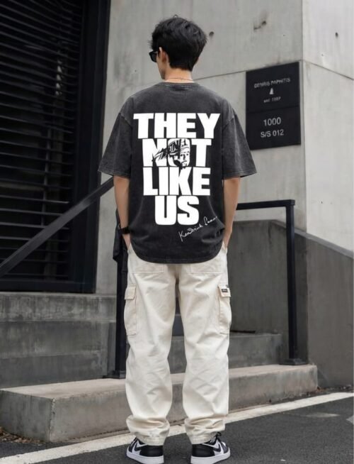 ​"They Not Like Us" Washed Drop Shoulder Tee