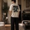 ​"Money Never Sleeps" Drop Shoulder Tee