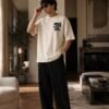 ​"Money Never Sleeps" Drop Shoulder Tee