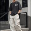 ​"They Not Like Us" Washed Drop Shoulder Tee